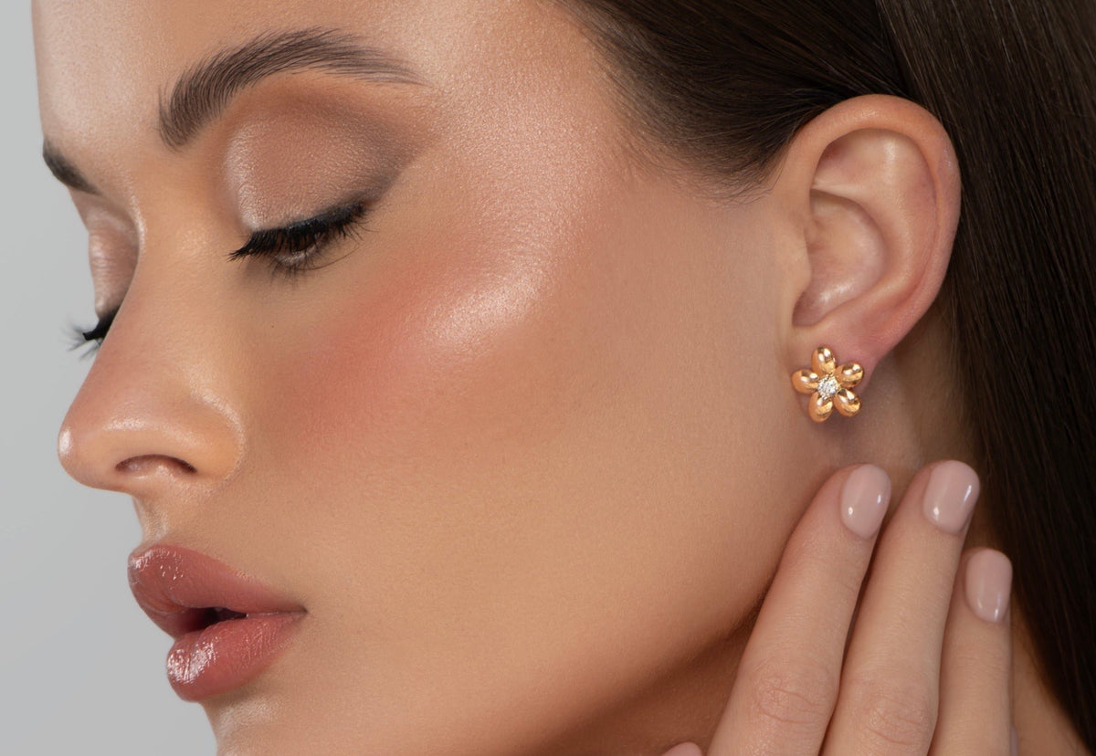 Model wearing the Gold Blossom Earrings